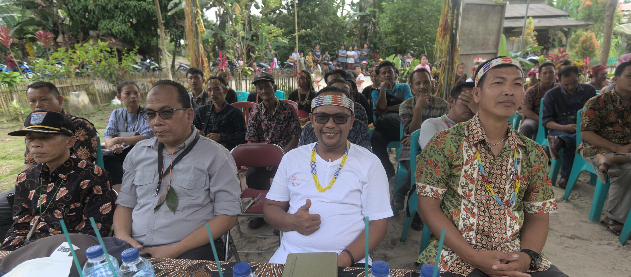 Fransiskus Yan (centre right) seated amongst Mentawai cultural learning hub leaders and Government officials at a cultural-based event facilitated by the Mentawai Foundation.