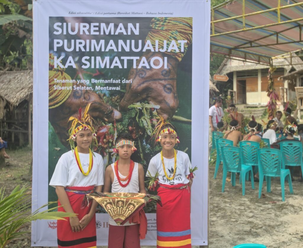 Suku Mentawai program students welcoming guests to the Plant Field Guide Book launch event