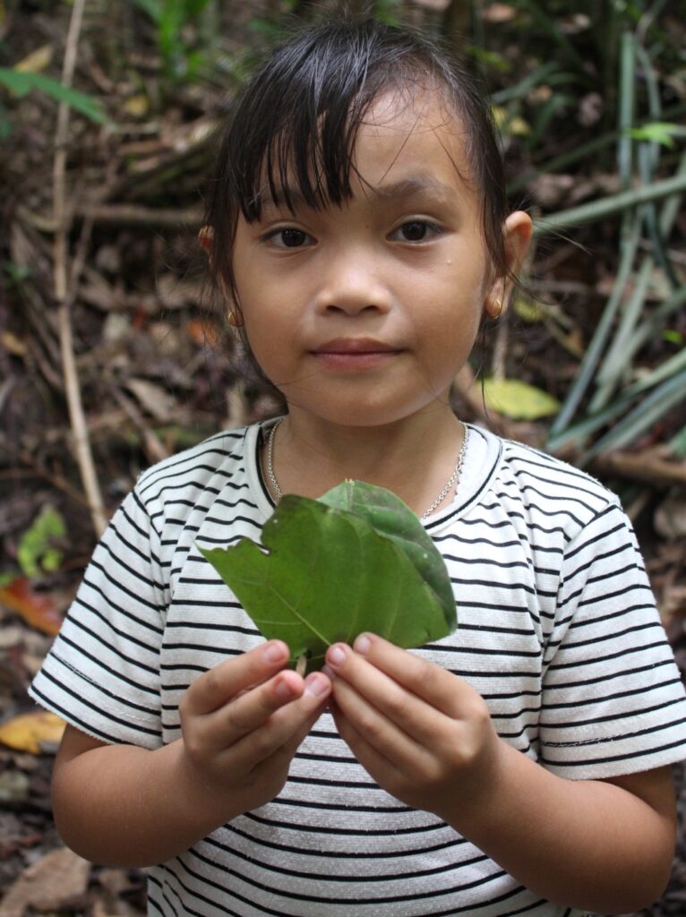 Young Dayak girl hoping for a better future for her forest